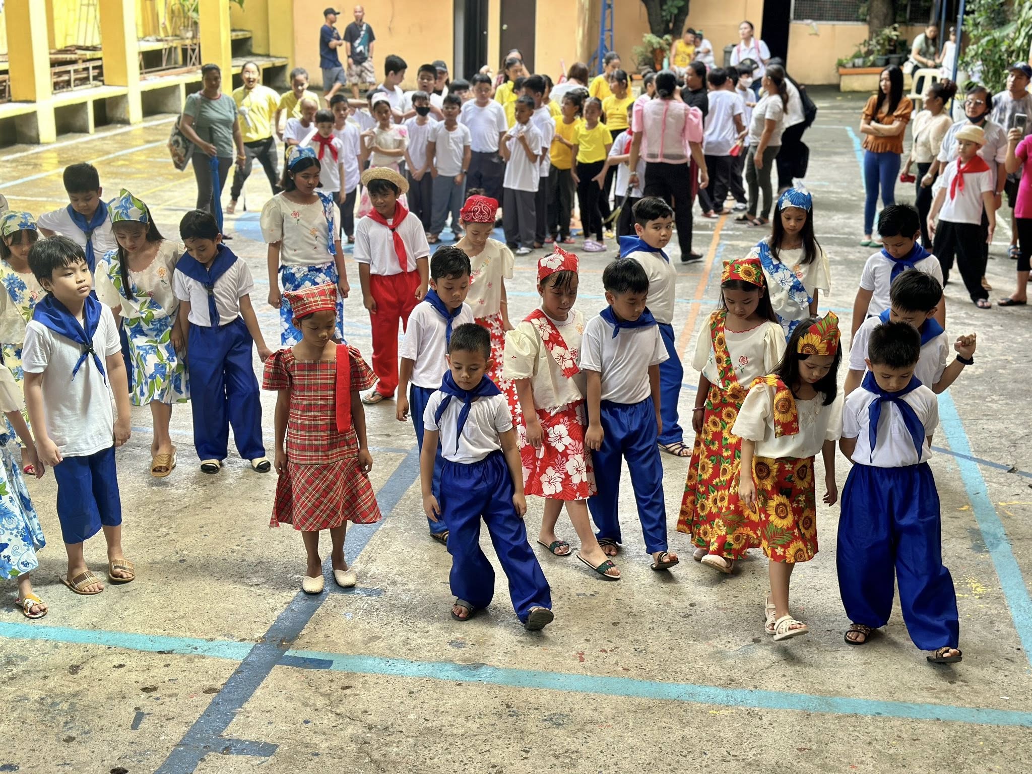 Young Christar Academy students celebrating Filipino culture